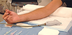 Figure 3. The ultrasound machine should be placed on the opposite side of the arm being used for IV insertion. 