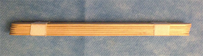 Figure 1. Tongue depressors taped together to act as a bite block