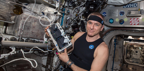 Canadian Space Agency astronaut David Saint-Jacques tries the Bio-Monitor, a smart shirt system is designed to measure and record astronauts’ vital signs.