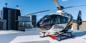 EC-135 on top of the University of Pittsburgh Medical Center Mercy Hospital helipad.