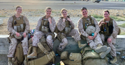 On Aug. 28, 2021, Dr. Kat Landa (center) and her fellow officers of the Shock Trauma Platoon waited to fly out of the Hamid Karzai International Airport in Kabul. Read more from Dr. Landa below.