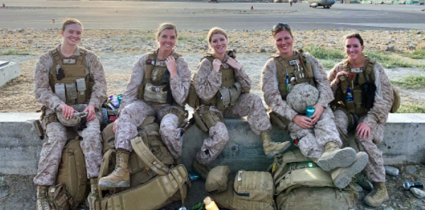 On Aug. 28, 2021, Dr. Kat Landa (center) and her fellow officers of the Shock Trauma Platoon waited to fly out of the Hamid Karzai International Airport in Kabul. Read more from Dr. Landa below.