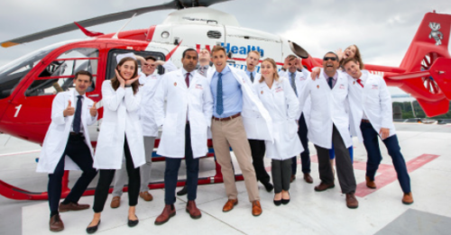 University of Wisconsin first-year residents have some fun on the Med Flight helipad during orientation